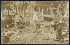 Noel Cox, George Rewai, and Felix Cox, cutting firewood, Chatham Islands