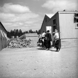 Prisoners of war carrying water to clean their living quarters at the prisoner of war camp near Featherston