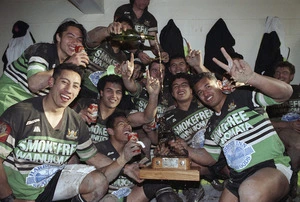 Wainuiomata rugby league team celebrate after winning the Wellington grand final - Photograph taken by Phil Reid
