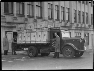 Harry Gluckman's Bedford truck loaded with crates, Wellington