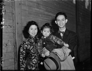 Asian couple and child