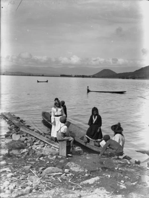 Children with canoes on Lake Taupo