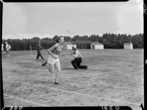 British Empire Games athlete running in race, Auckland