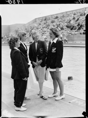 Four British Empire Games swimmers poolside, Olympic Pool, Newmarket, Auckland