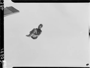 Diver mid-air during a dive, 1950 British Empire Games, Auckland