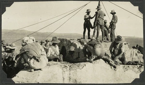 Soldiers filling water bottles on the Hebron Road during World War I