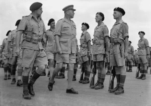 Brigadier Lindsay Inglis and Lieutenant Colonel R L McGaffin inspecting members of the 19th Armoured Regiment