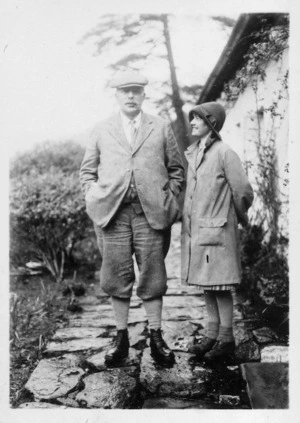 [Sir Ernest Rutherford and Eileen (Bay) de Renzie, outside cottage in Wales]