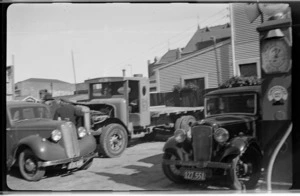 Cars parked at business premises of Coutts Bros and Hare Ltd, Willis St, Wellington