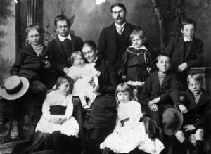 Charles John Johnston, his wife Alice, and their nine children