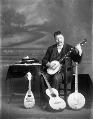 Man holding a banjo