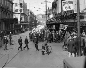 A march in Wellington protesting wage cuts turning from Cuba St into Manners St