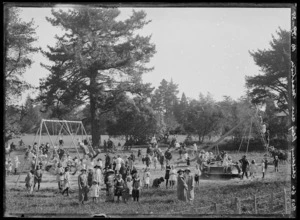 Large group of children in the play area, Queens Park, Masterton