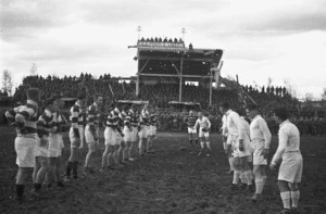 Kaye, George, 1914- : 2 NZ Div Ammo and 22 NZ Bn teams line up on the stadium in the final game of the Freyberg Cup, Forli, Italy