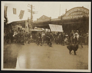Street parade with peace banner, 1918 or 1919