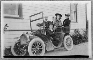 Unidentified group in a Clement-Talbot motor car, possibly the family of Dr James Malcolm Mason