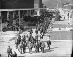 [Unemployed workers walking through an industrial area, Wellington]