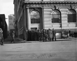 Unemployed men crowded outside the Hope Gibbons building, Dixon Street, Wellington