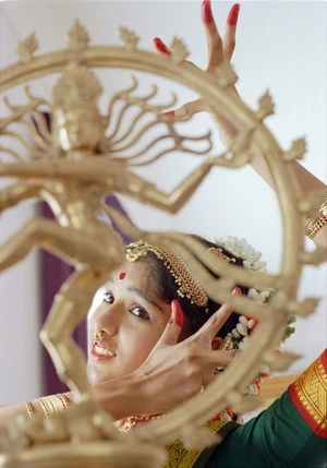 Niranthari Chinniah practises an Indian classical dance to a song devoted to the goddess Damakshi of Kanchi temple - Photograph taken by Ross Giblin