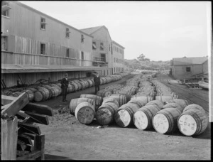 Barrels of tallow on the wharf at Castlecliff, Wanganui