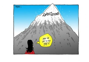 Jacinda Ardern looking at a mountain of "Expectations" and wondering how she can move it