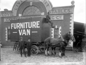 Horse drawn furniture removal van in front of the Canterbury Carrying Co's building, St Asaph street, Christchurch