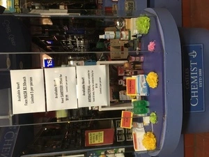 Digital photograph of COVID-19 related advertising at John Castle Chemists, Newtown