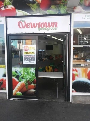 Digital photograph of COVID-19 signage at Newtown Greengrocer