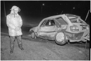 Firefighter at motorway accident, Haywards, Lower Hutt