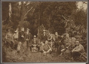 Members of the Levin-Waiopehu Tramping Club posing on edge of bush