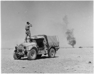 New Zealand World War 2 soldier Arch Currie on a truck, El Alamein, Egypt - Photograph taken by H Paton