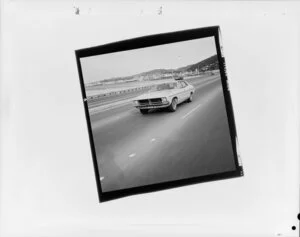 Ford Falcon driving down motorway