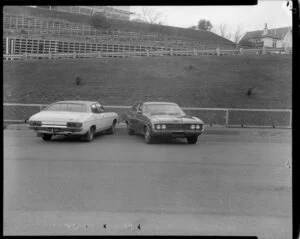 Two Ford cars in carpark