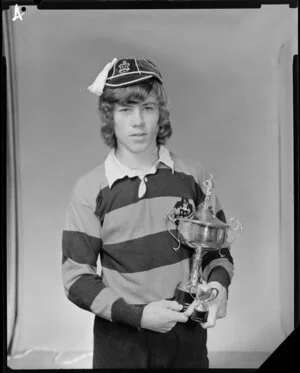 Mr Henderson with sporting trophy