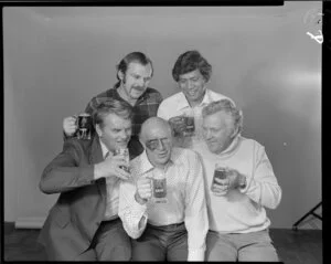 Men drinking beer with black eyes