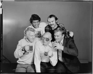 Men drinking beer with black eyes