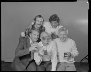 Men drinking beer with black eyes