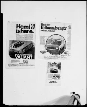 Lineouts of various car brochures and advertisements