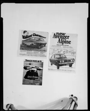 Lineouts of various car brochures and advertisements