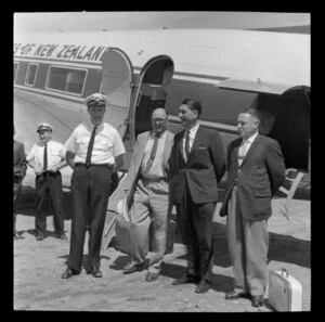 Captain Daniells with unidentified group, Airlines of New Zealand, Taupo