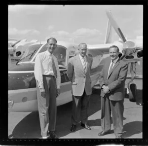 Mr A H Harding, O Dowdie and K Busby during the Aero Commander tour, Whenuapai, Auckland