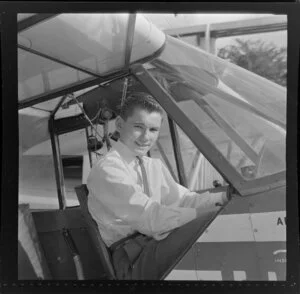 Mr Philip White, at the controls of a aeroplane