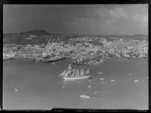 Auckland waterfront and wharves, with sailing ship Esmeralda on the harbour
