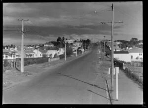 Unidentified Auckland street with Auckland Bus Company bus in the distance