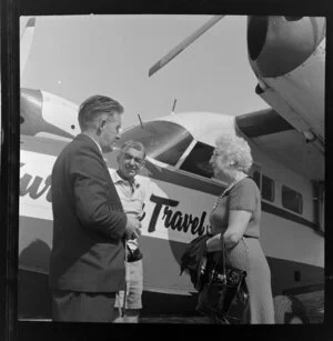 Mrs Musick with two unidentified men, Tourist Air Travel