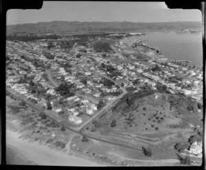Mount Maunganui domain with southern suburb, looking towards fertiliser works and wharves