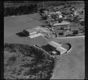 Auckland school buildings, playing field and houses