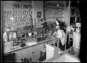 Chelsea Sugar Refinery, Birkenhead, Auckland, showing laboratory with few men working