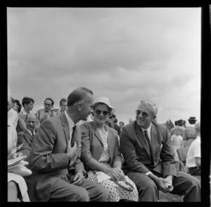 Two unidentified men and a woman at the Royal New Zealand Aero Club pageant, Ardmore