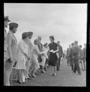 Lady Fergusson shaking hands at the Royal New Zealand Aero Club pageant, Ardmore